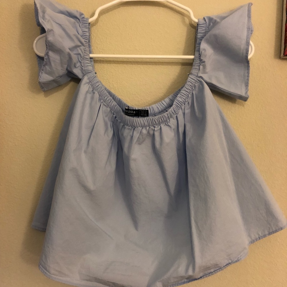 Off the shoulder blouse in light blue Bershka